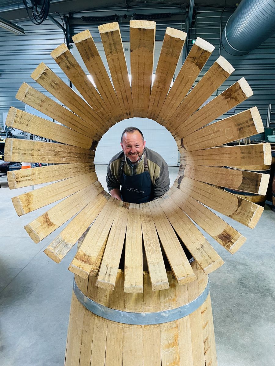 </who>An artsy shot of Daniel Wittling through a partially made barrel.